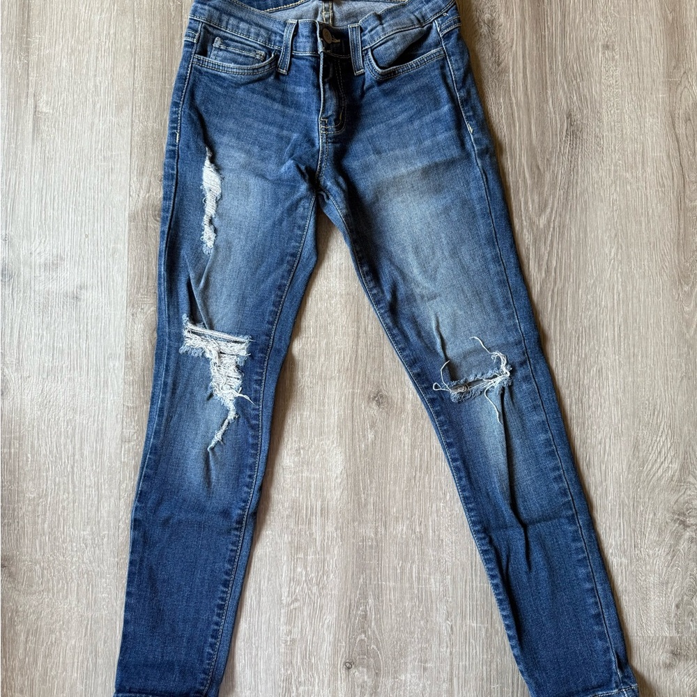 Distressed Blue Denim Jeans